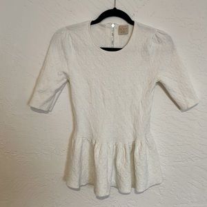 Torn by Ronny Kobo White Peplum Top